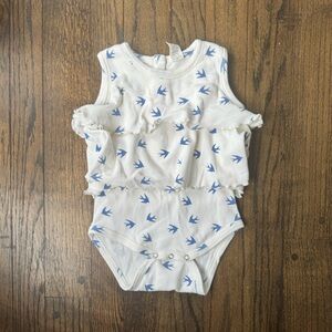 Kate Quinn ruffle bodysuit and headband